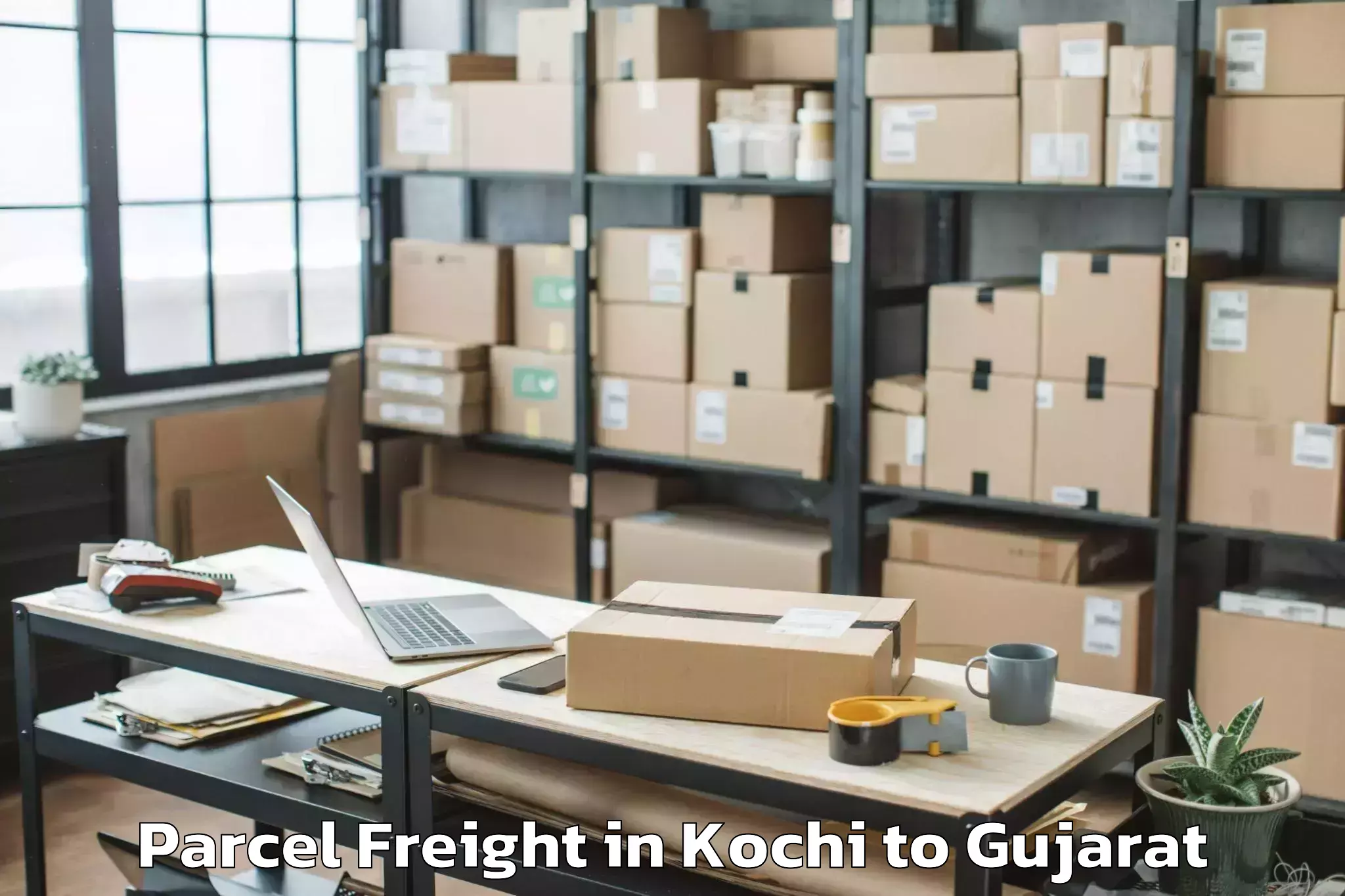 Get Kochi to Kosamba Parcel Freight